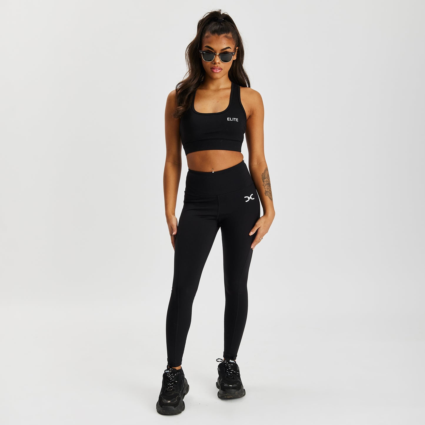 Envolve Midnight black cropped sports bra with racer back and scoop neck